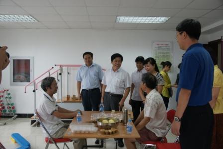 市残联领导莅临东城区建国门街道调研