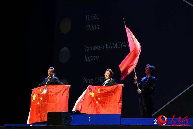 须莉莉、陈萍分别获得文本处理比赛金牌和铜牌。王远摄